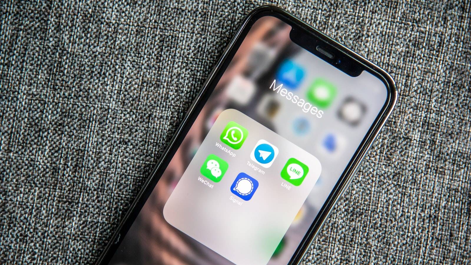 A professional smartphone mockup showing a WhatsApp Business profile screen with a perfectly centered circular avatar.